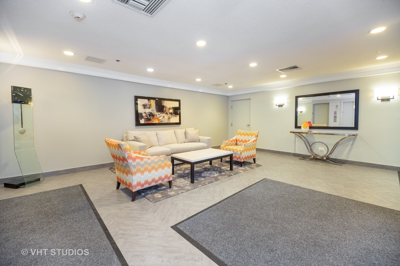 1800 Mission Hills Road, Unit 210 Northbrook, IL 60062 - Photo 4 of 16 a living room with furniture and a flat screen tv