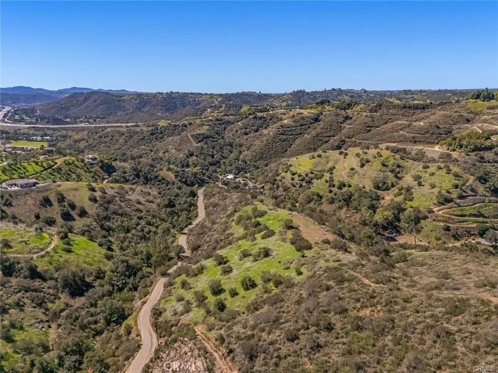 0 Stewart Canyon Road Fallbrook, CA 92028 - Photo 3 of 19 a view of a mountain in the distance in a field