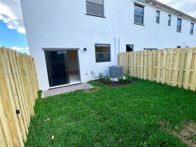 a view of a park with swings