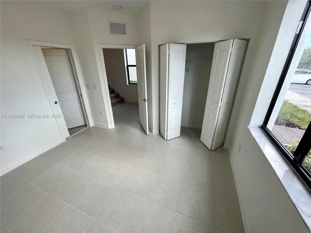 an entryway with a room