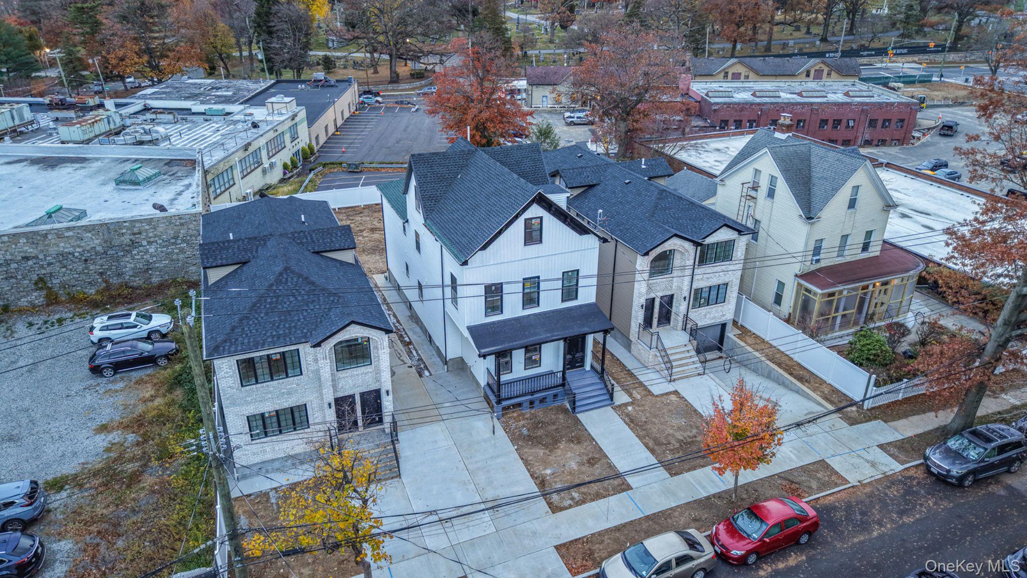 340 East 234th Street Bronx, NY 10470 - Photo 7 of 14 an aerial view of residential houses with outdoor space