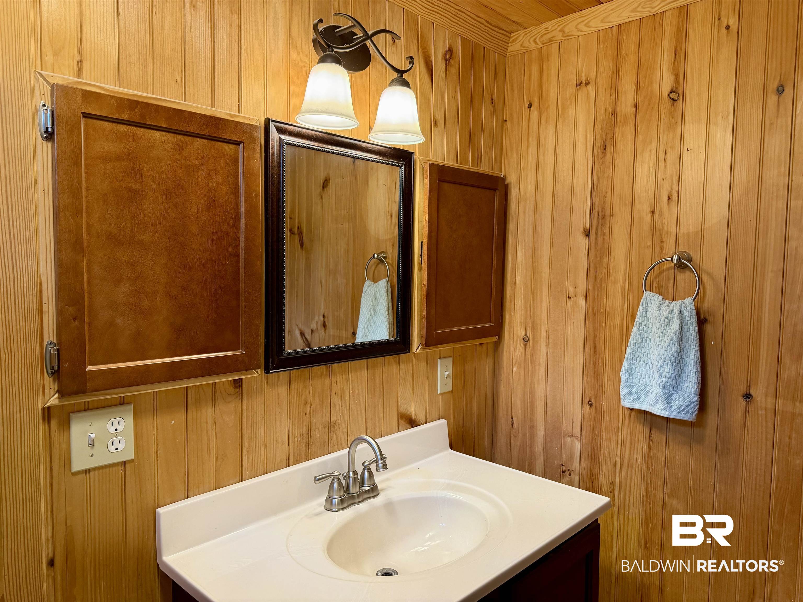 762 Buddy Lake Road Brewton, AL 36426 - Photo 11 of 20 Bathroom featuring wood-paneled walls and ceiling