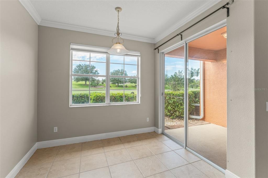 868 Assembly Court Reunion, FL 34747 - Photo 15 of 43 a view of an empty room with windows