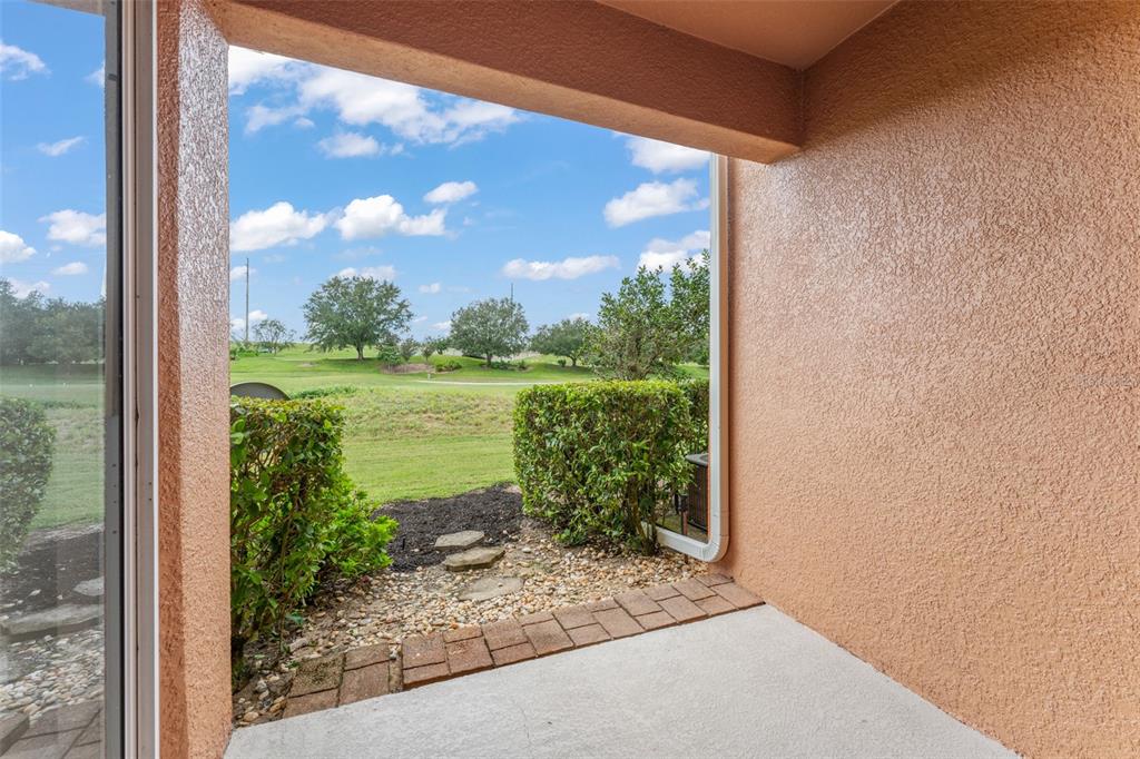 868 Assembly Court Reunion, FL 34747 - Photo 18 of 43 a view of a garden from a window