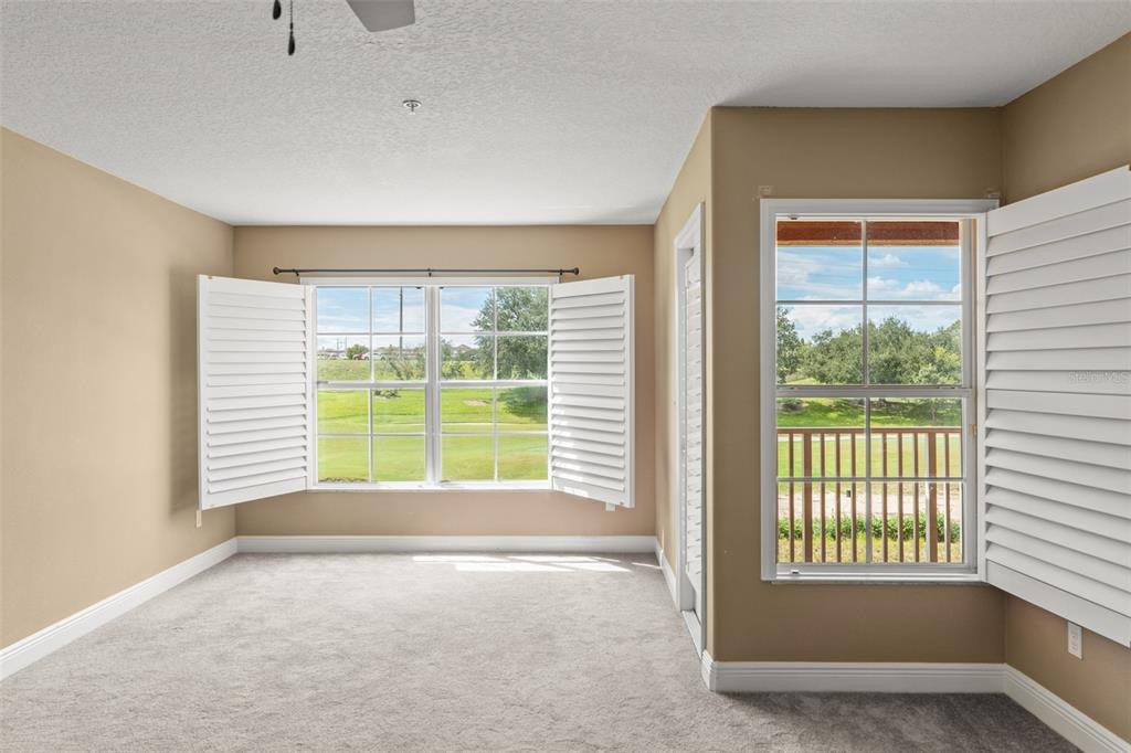 868 Assembly Court Reunion, FL 34747 - Photo 23 of 43 a view of an empty room with a window