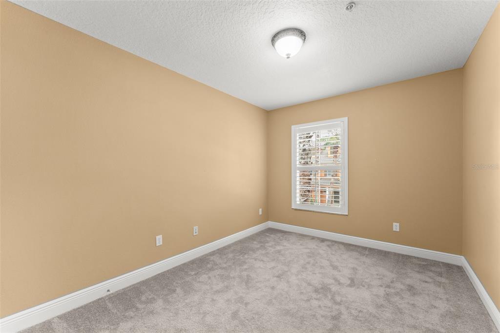 868 Assembly Court Reunion, FL 34747 - Photo 28 of 43 a view of an empty room with a window