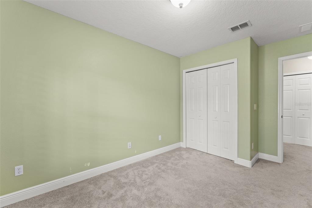 868 Assembly Court Reunion, FL 34747 - Photo 32 of 43 an empty room with closet