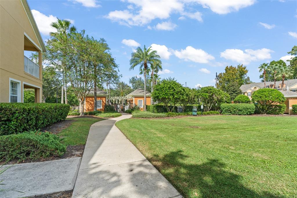 868 Assembly Court Reunion, FL 34747 - Photo 33 of 43 a view of a street with a houses in the background