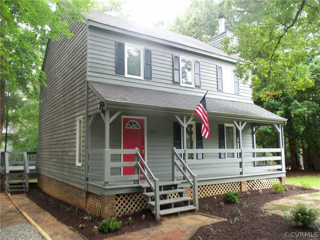 2906 Brookforest Road Midlothian, VA 23112 - Photo 1 of 13 a front view of a house with garden