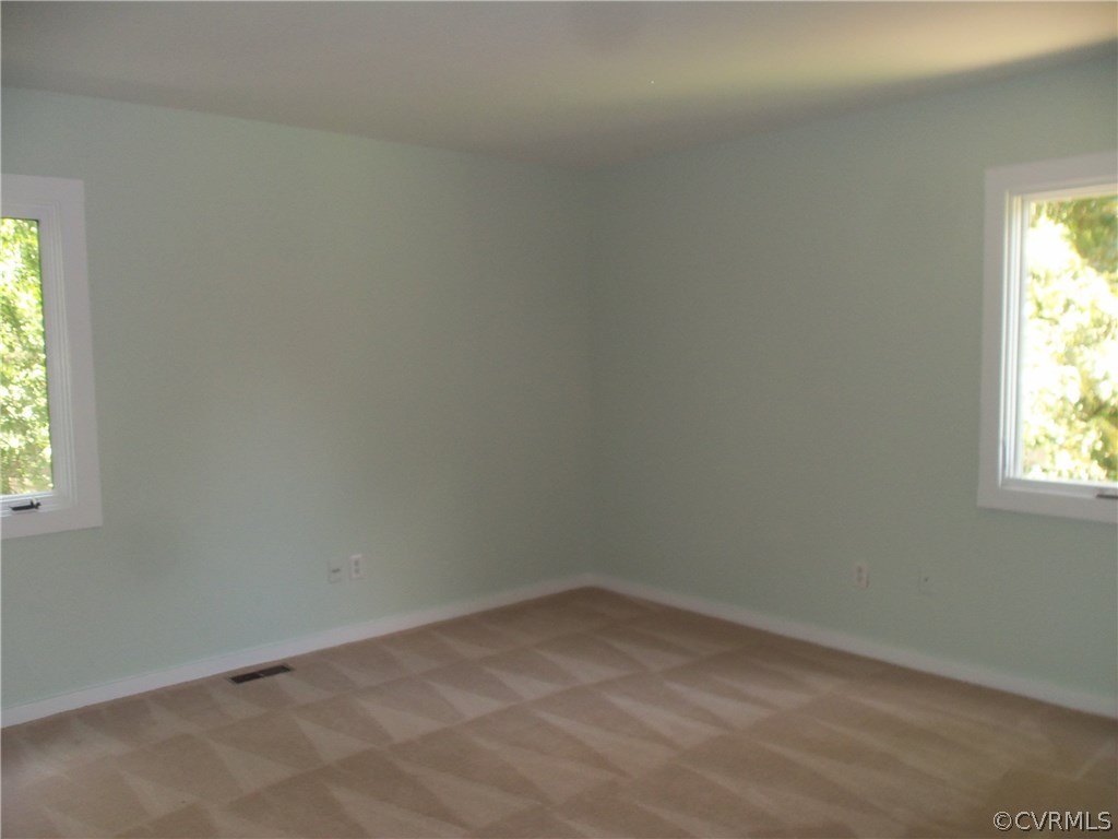 2906 Brookforest Road Midlothian, VA 23112 - Photo 12 of 13 an empty room with a window