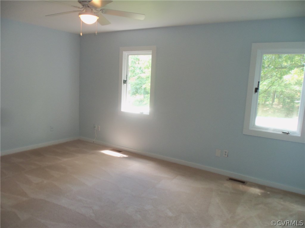 2906 Brookforest Road Midlothian, VA 23112 - Photo 8 of 13 an empty room with a window