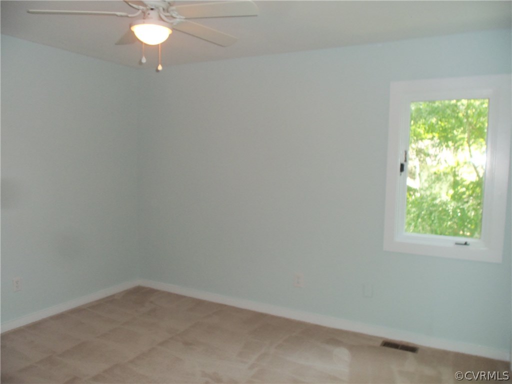 2906 Brookforest Road Midlothian, VA 23112 - Photo 10 of 13 an empty room with a window