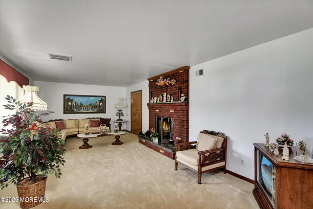 a view of front door with yard