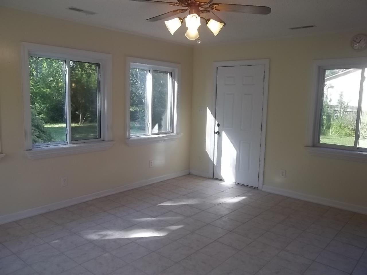 208 Stratford Road Havelock, NC 28532 - Photo 25 of 30 Sun Room Back Yard Direct Access
