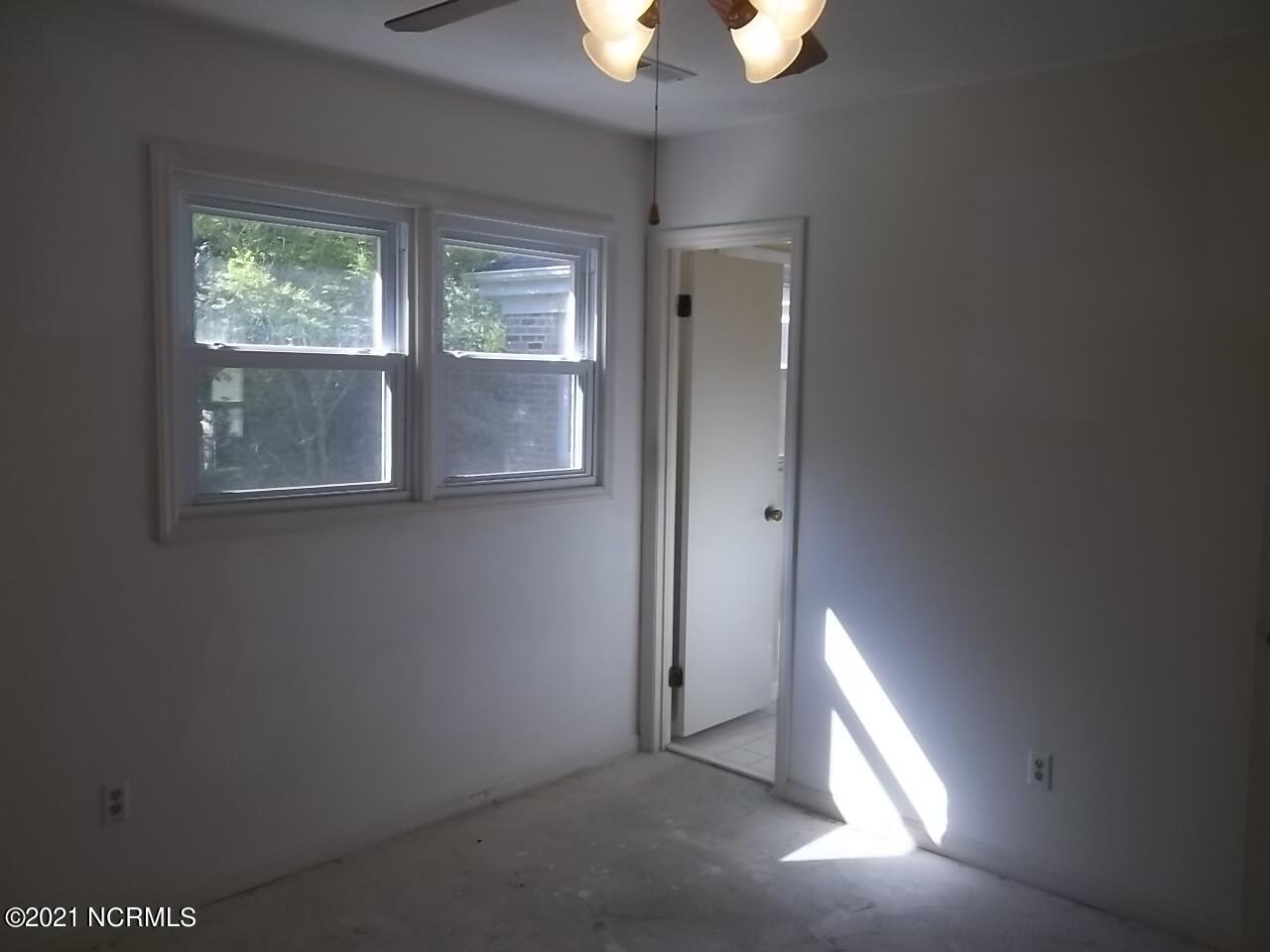 208 Stratford Road Havelock, NC 28532 - Photo 27 of 30 Principal Bedroom & Adjoining Bath Room