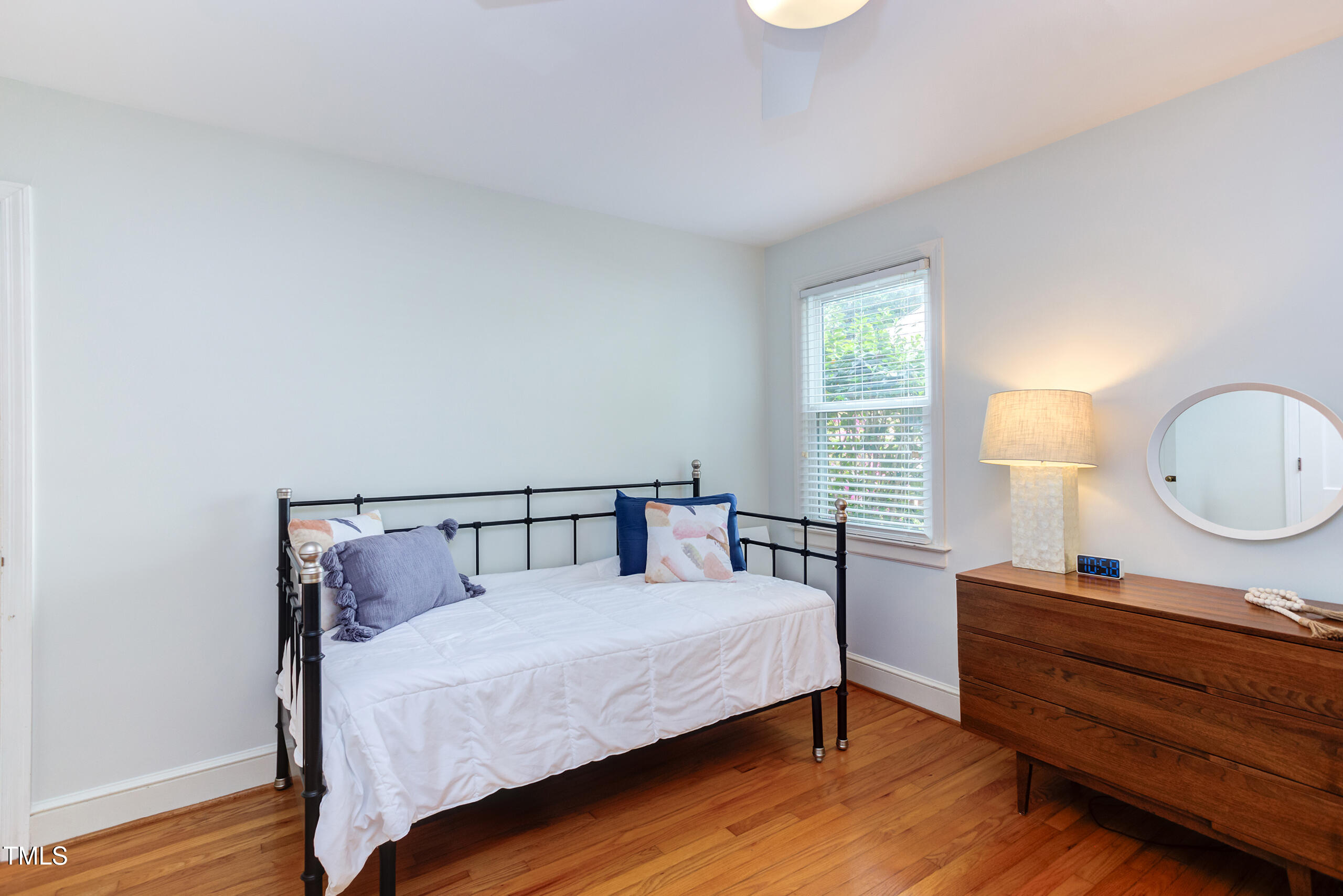 2811 Van Dyke Avenue Raleigh, NC 27607 - Photo 30 of 57 a bed room with a bed and window