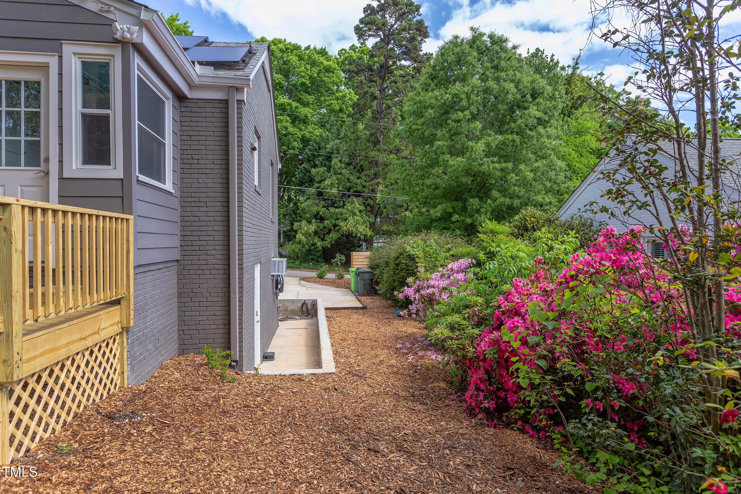 2811 Van Dyke Avenue Raleigh, NC 27607 - Photo 40 of 57 a view of a house that has a flower garden