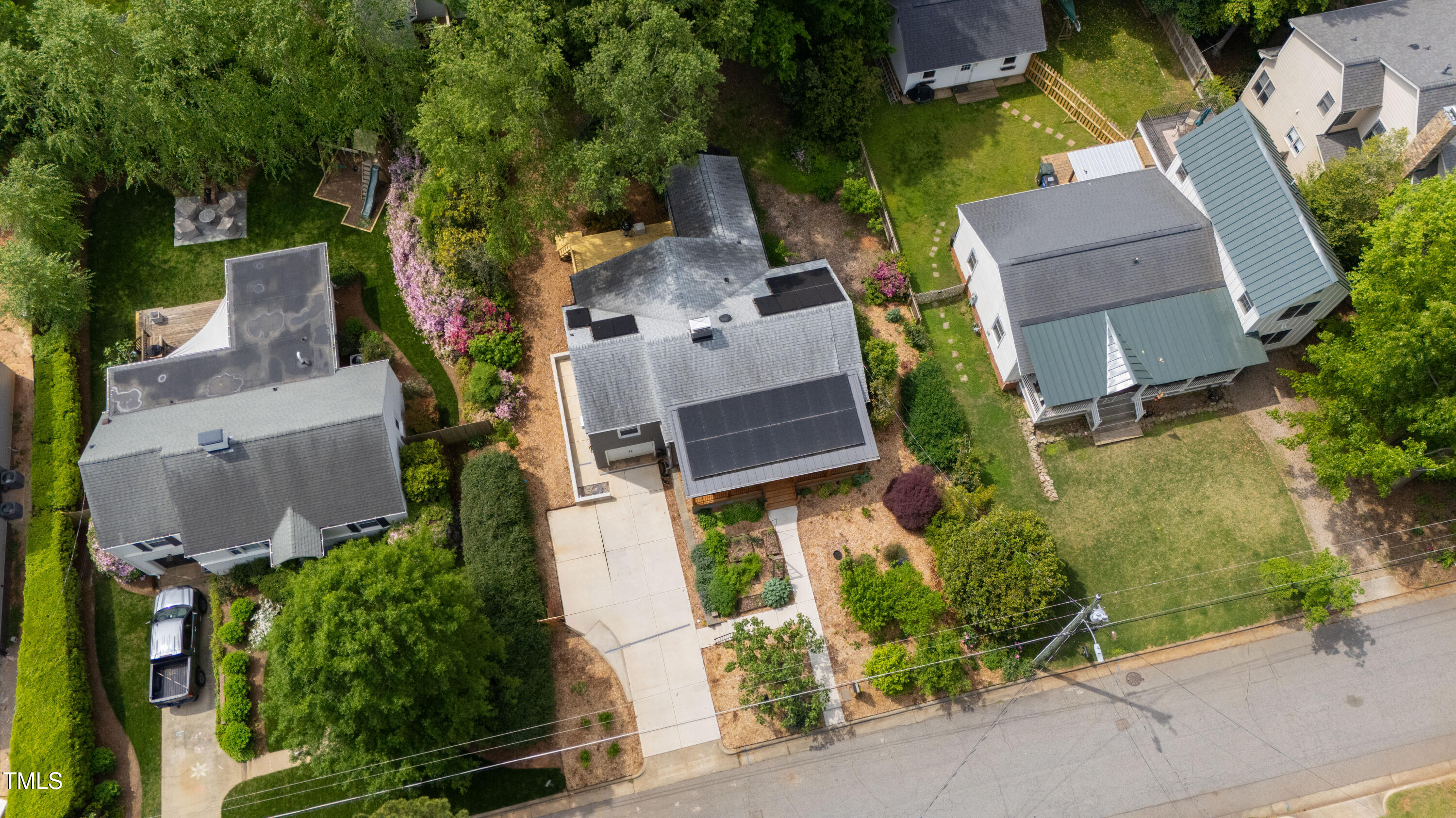 2811 Van Dyke Avenue Raleigh, NC 27607 - Photo 53 of 57 an aerial view of a house with a yard basket ball court and outdoor seating