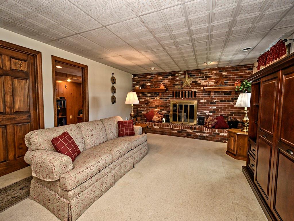 303 Kings Road Apollo, PA 15613 - Photo 13 of 24 The fabulous family room offers warmth and coziness for relaxing in the evening. Doorway to the left leads to the designated den/home office!