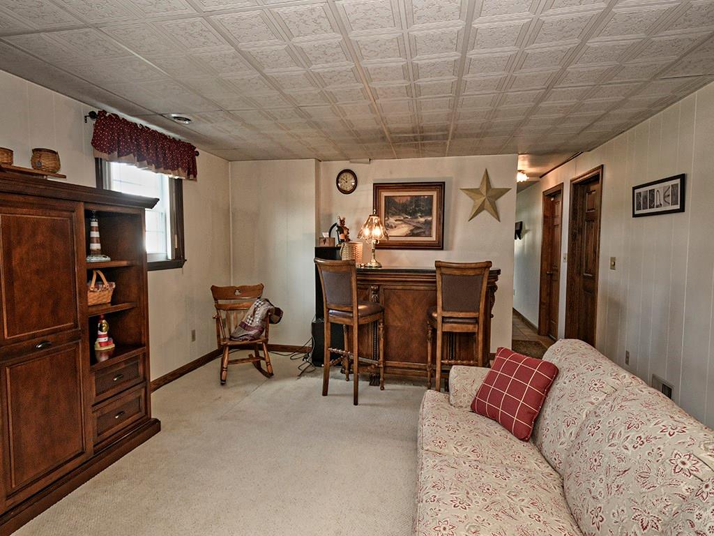 303 Kings Road Apollo, PA 15613 - Photo 15 of 24 Lower Level Family Room - This is a great room to watch sports, celebrate friends and family, or quietly curl up with a book!
