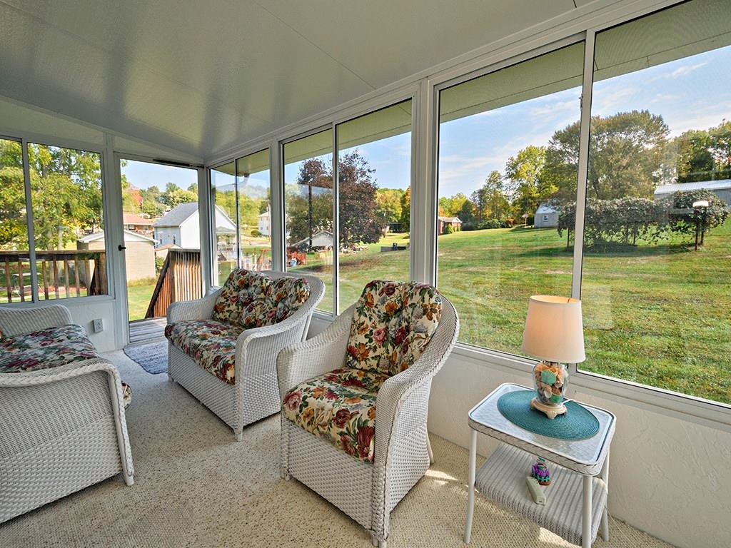 303 Kings Road Apollo, PA 15613 - Photo 22 of 24 Three Season Sunroom - you can access the side deck from here, out door and to left.