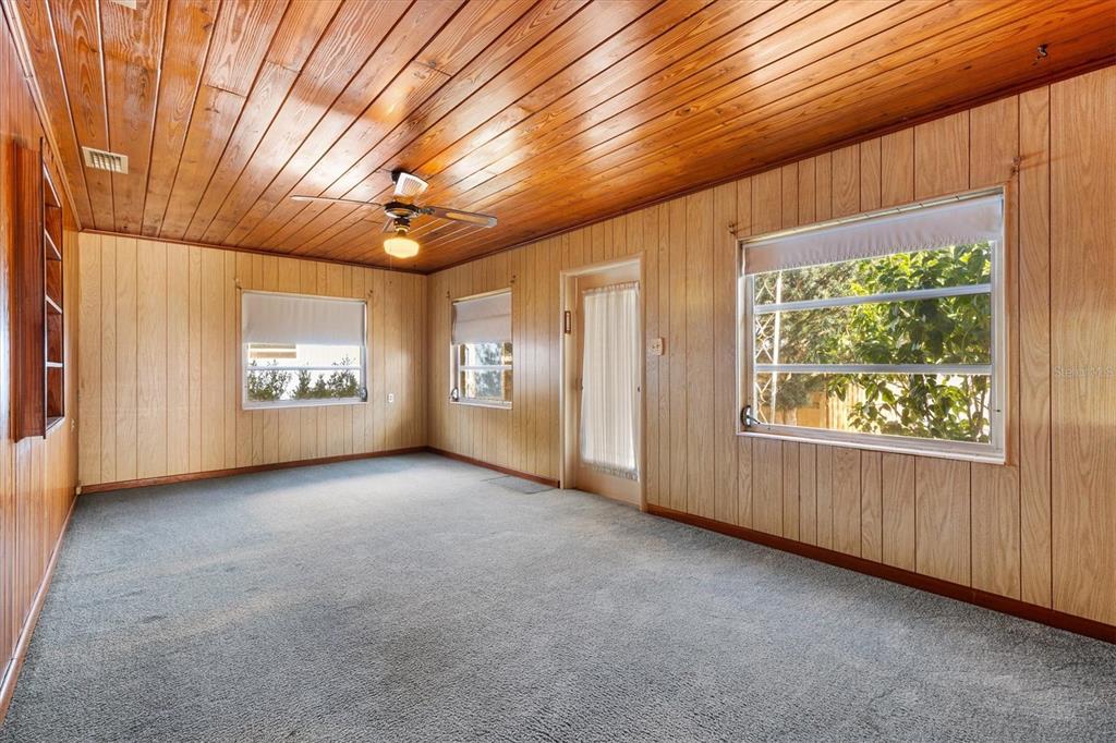 5605 Berts Road Lady Lake, FL 32159 - Photo 13 of 38 an empty room with windows