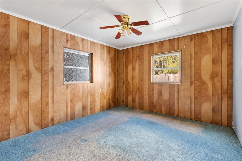5605 Berts Road Lady Lake, FL 32159 - Photo 18 of 38 a view of an empty room with a window