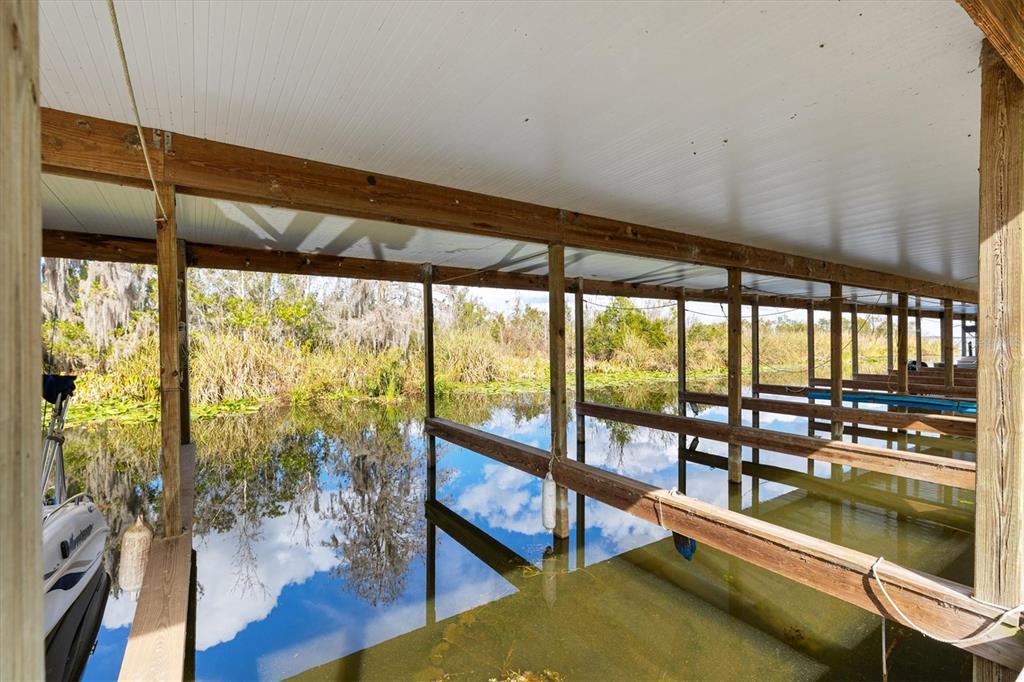5605 Berts Road Lady Lake, FL 32159 - Photo 2 of 38 a view of a large window with wooden floor