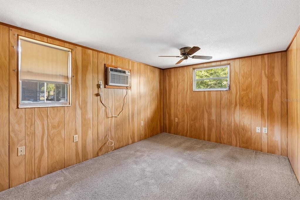 5605 Berts Road Lady Lake, FL 32159 - Photo 25 of 38 a view of an empty room with a window