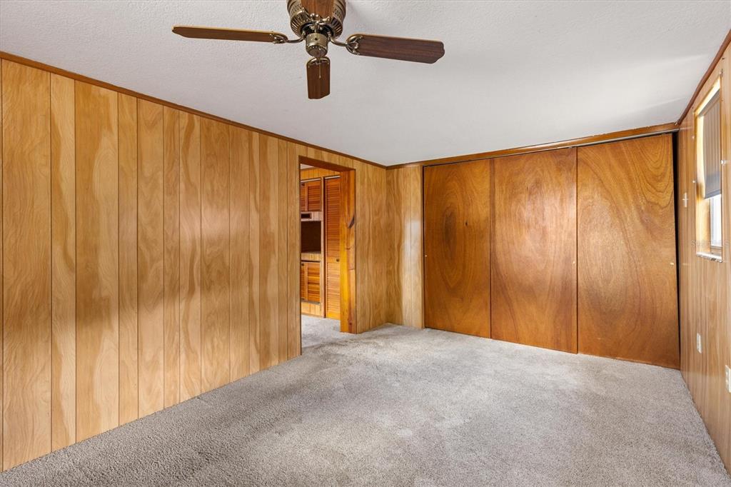 5605 Berts Road Lady Lake, FL 32159 - Photo 26 of 38 a view of a big room with wooden walls