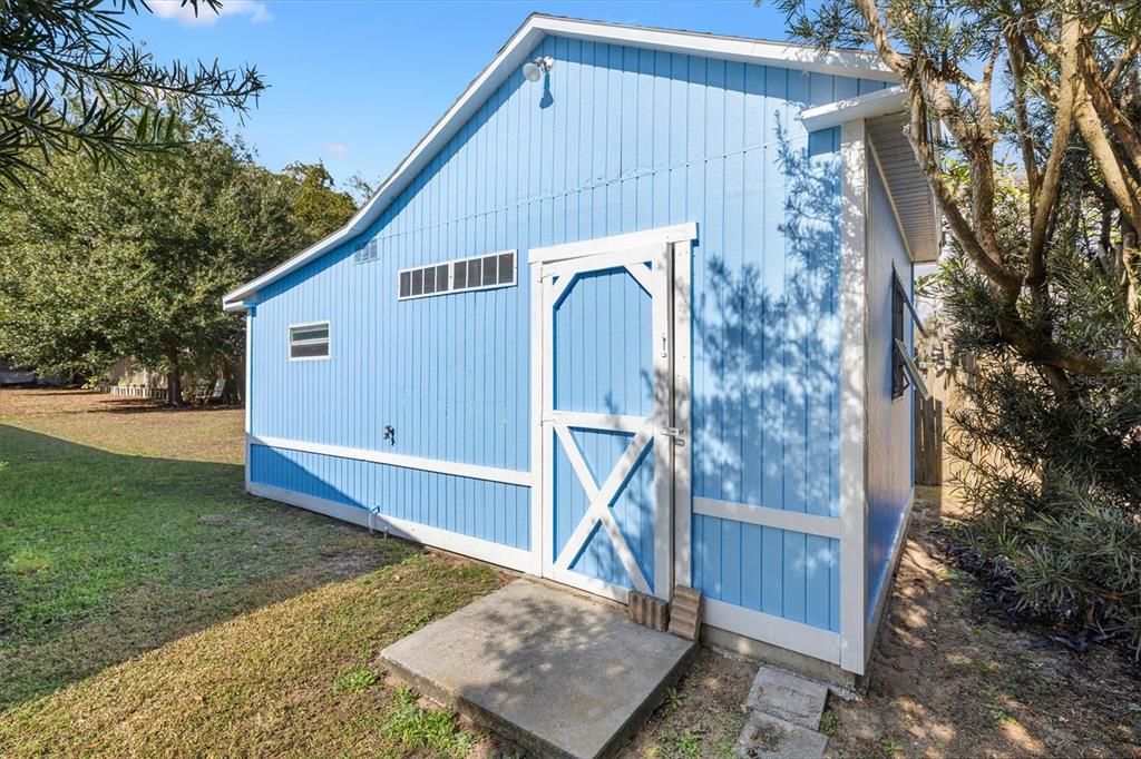 5605 Berts Road Lady Lake, FL 32159 - Photo 29 of 38 a view of a small house