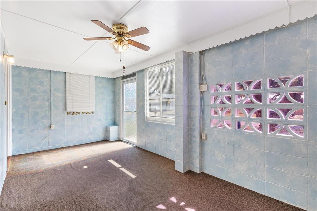 5605 Berts Road Lady Lake, FL 32159 - Photo 8 of 38 a view of an empty room with a window
