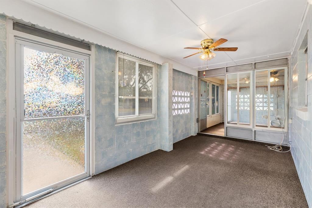 5605 Berts Road Lady Lake, FL 32159 - Photo 9 of 38 a view of an empty room with a window