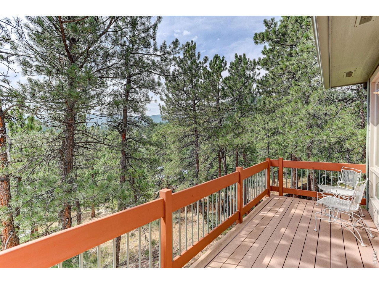 65 Betasso Road Boulder, CO 80302 - Photo 23 of 38 a balcony with wooden floor and fence