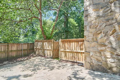a view of a wooden fence