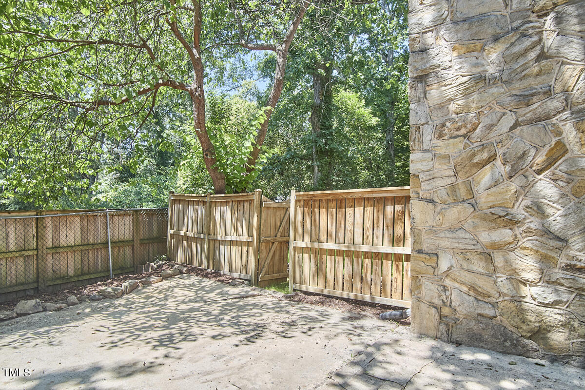 2203 University Drive Durham, NC 27707 - Photo 31 of 40 a view of a wooden fence