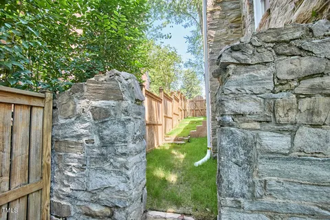 a view of a backyard with a small cabin