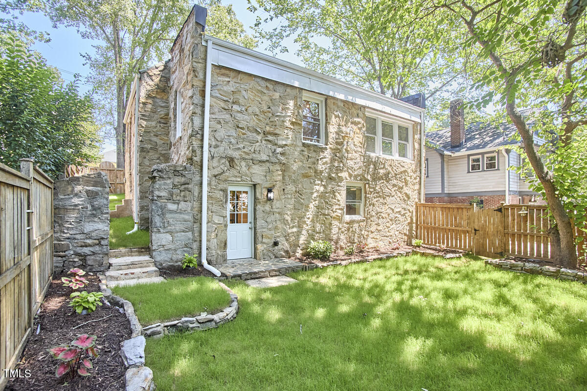 2203 University Drive Durham, NC 27707 - Photo 34 of 40 a view of backyard with garden