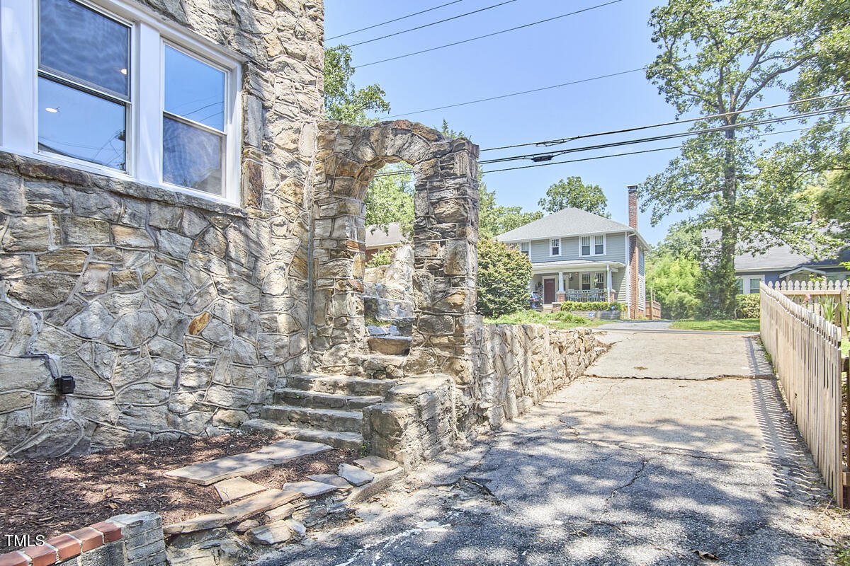 2203 University Drive Durham, NC 27707 - Photo 39 of 40 a front view of a house with a yard