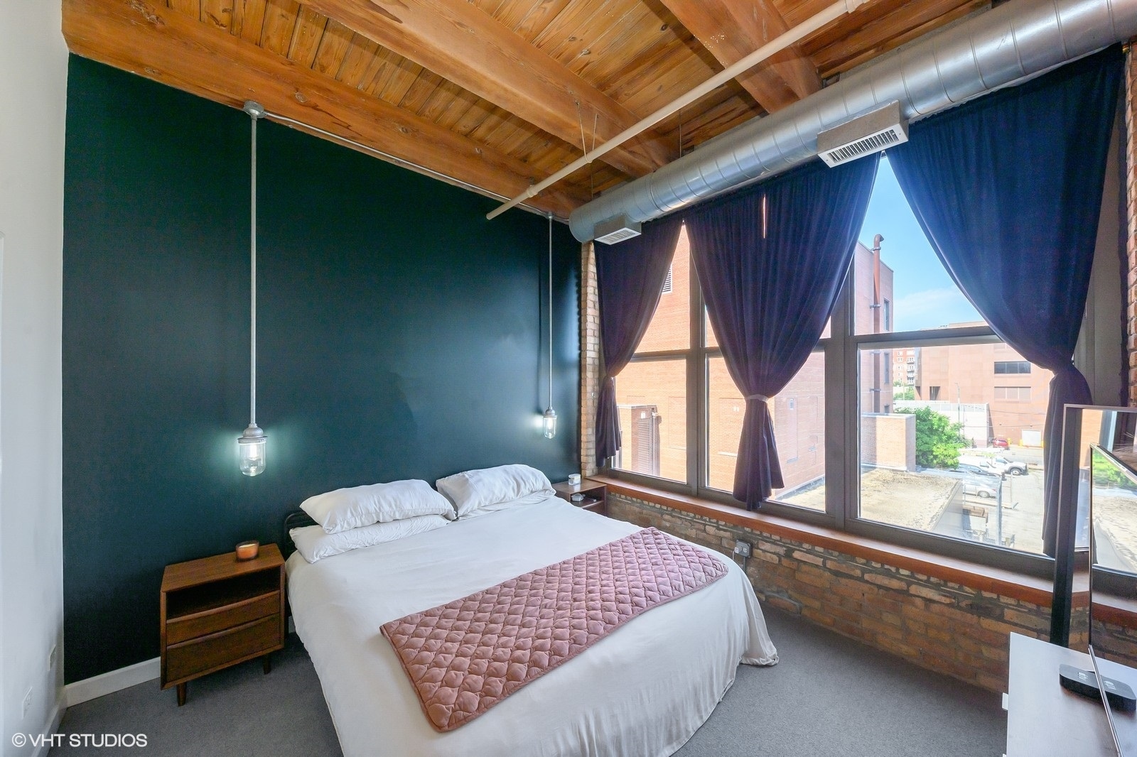 1330 West Monroe Street, Unit 311 Chicago, IL 60607 - Photo 11 of 16 a bedroom with a bed and window