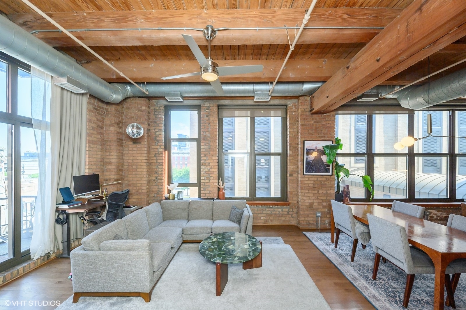 1330 West Monroe Street, Unit 311 Chicago, IL 60607 - Photo 3 of 16 a living room with furniture and a large window
