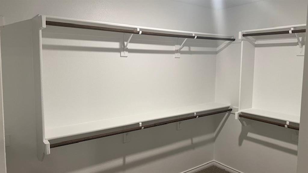 1403 Forever Way Princeton, TX 75407 - Photo 6 of 11 a close up view of racks on the wall