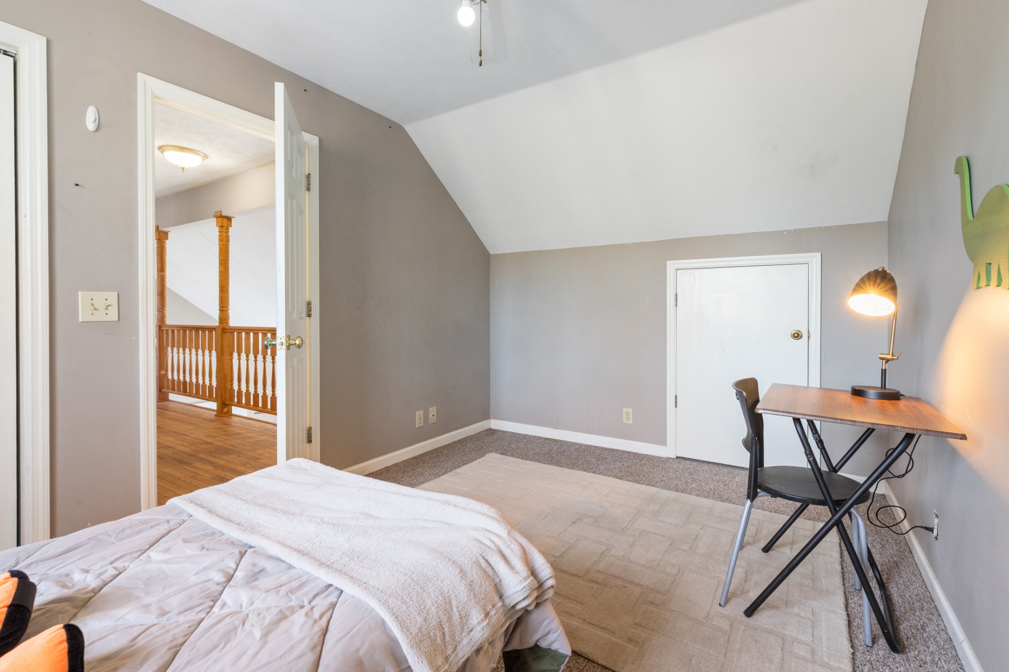 251 Rouse Road Dickson, TN 37055 - Photo 21 of 46 a bedroom with a bed and chair