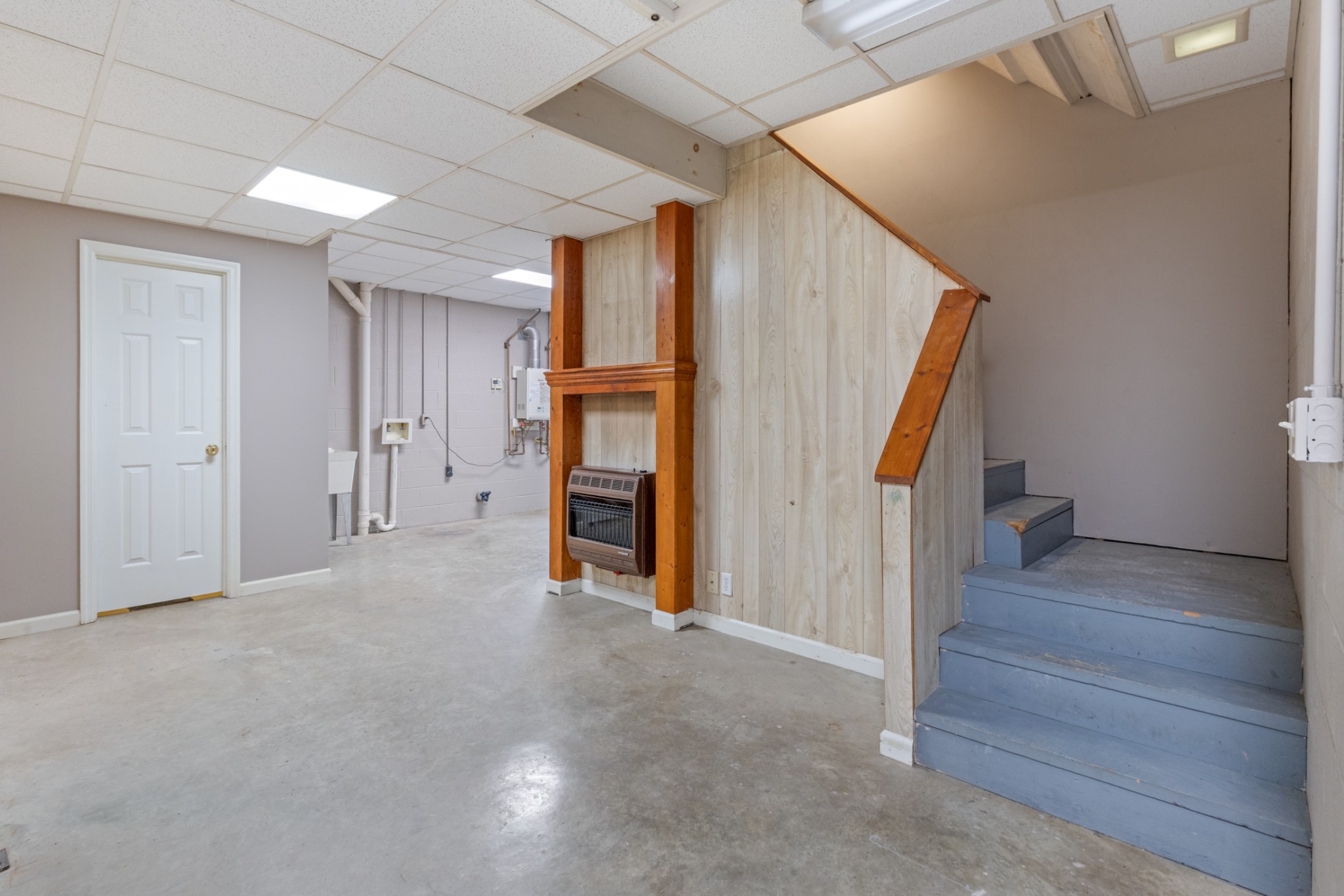251 Rouse Road Dickson, TN 37055 - Photo 26 of 46 a view of empty room with stairs and furniture