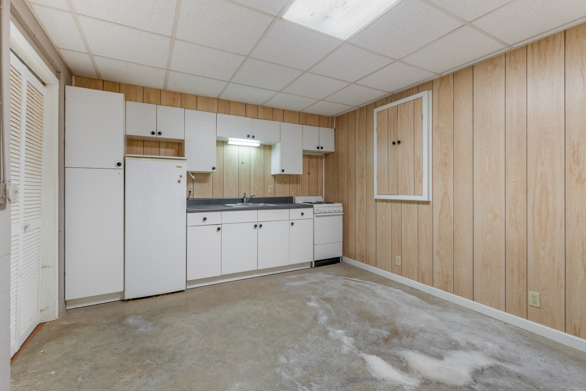 251 Rouse Road Dickson, TN 37055 - Photo 27 of 46 a view of a kitchen with a sink and cabinet area