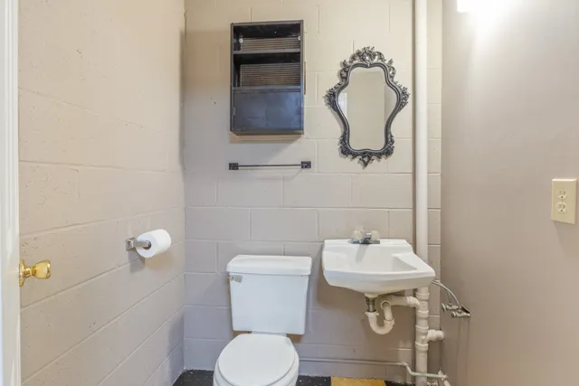 a view of an empty room with empty shelves