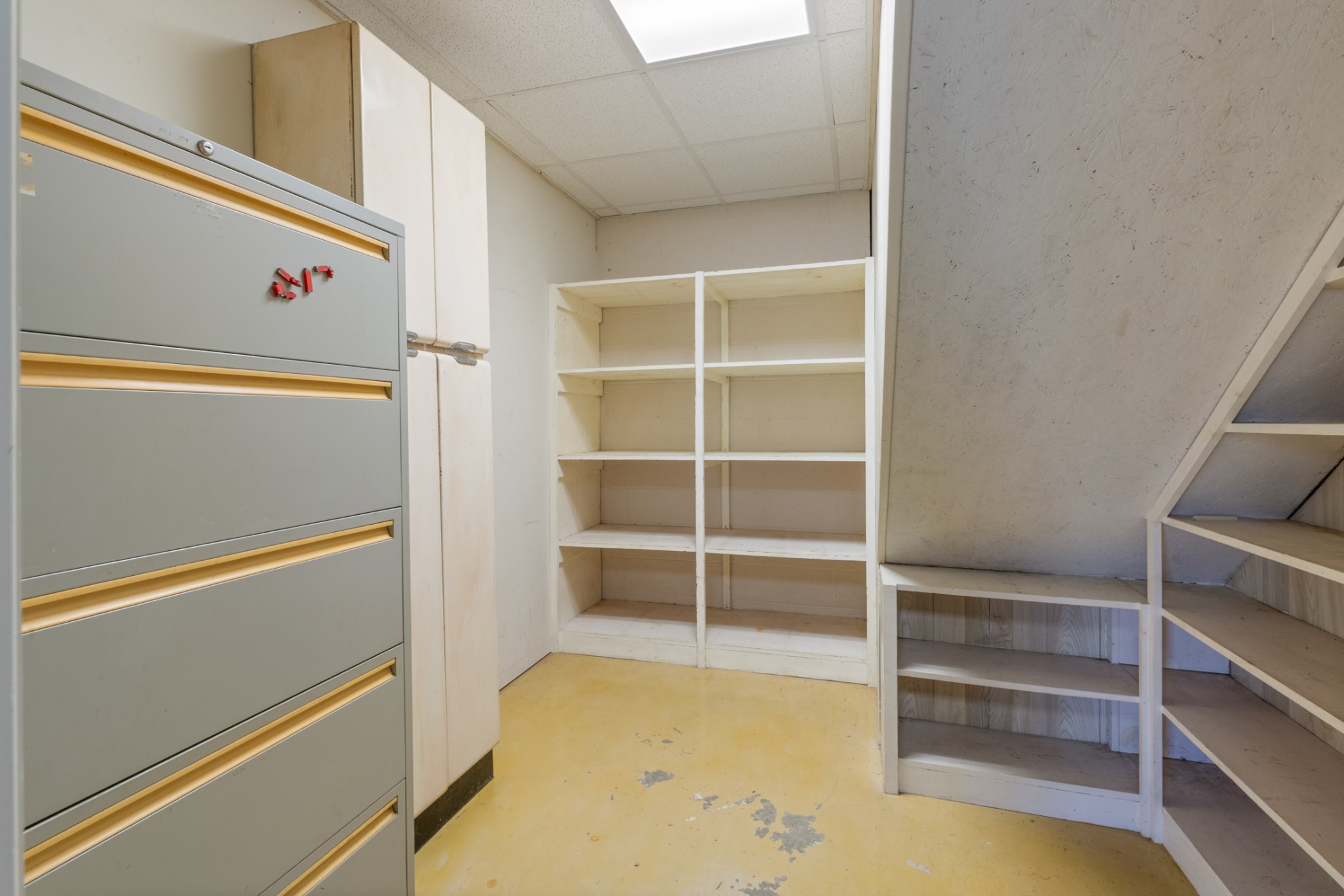 251 Rouse Road Dickson, TN 37055 - Photo 31 of 46 a view of an empty room with empty shelves