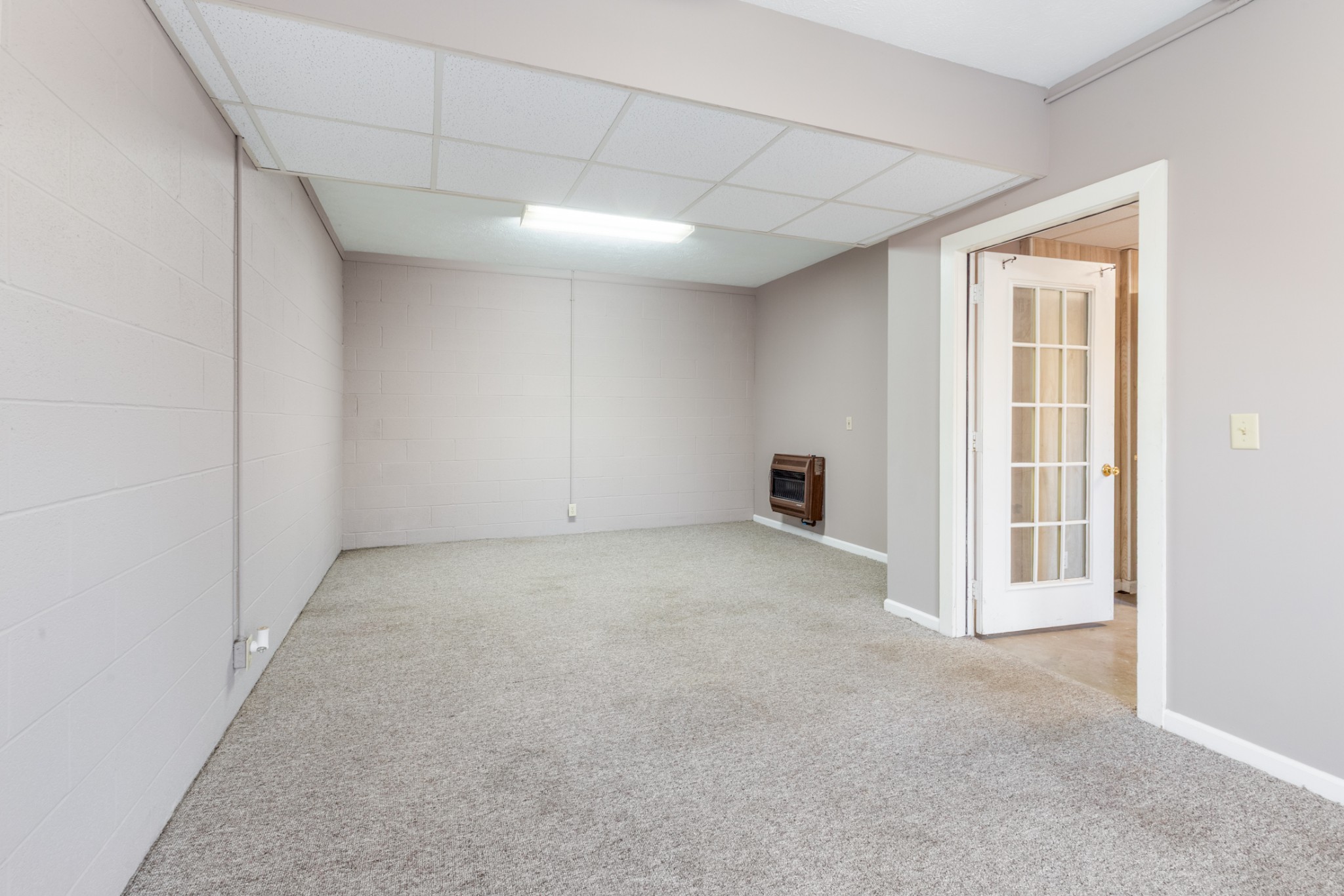 251 Rouse Road Dickson, TN 37055 - Photo 33 of 46 a view of an empty room with a window