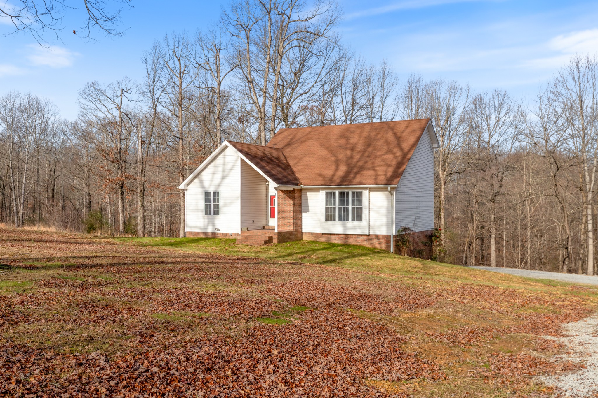 251 Rouse Road Dickson, TN 37055 - Photo 36 of 46 a view of a house with a yard
