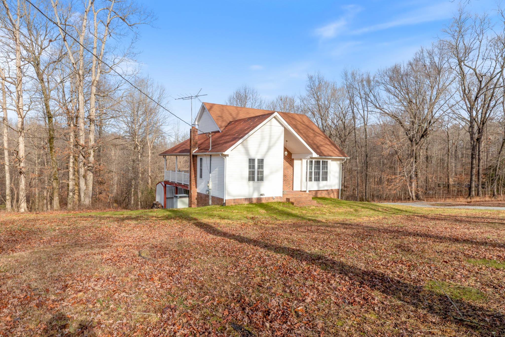 251 Rouse Road Dickson, TN 37055 - Photo 39 of 46 a view of a house with a yard